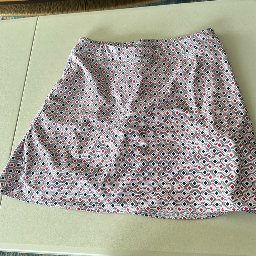 Lady Pinseeker Performance Golf Skort with Back glove pocket. Athletic inside Sm